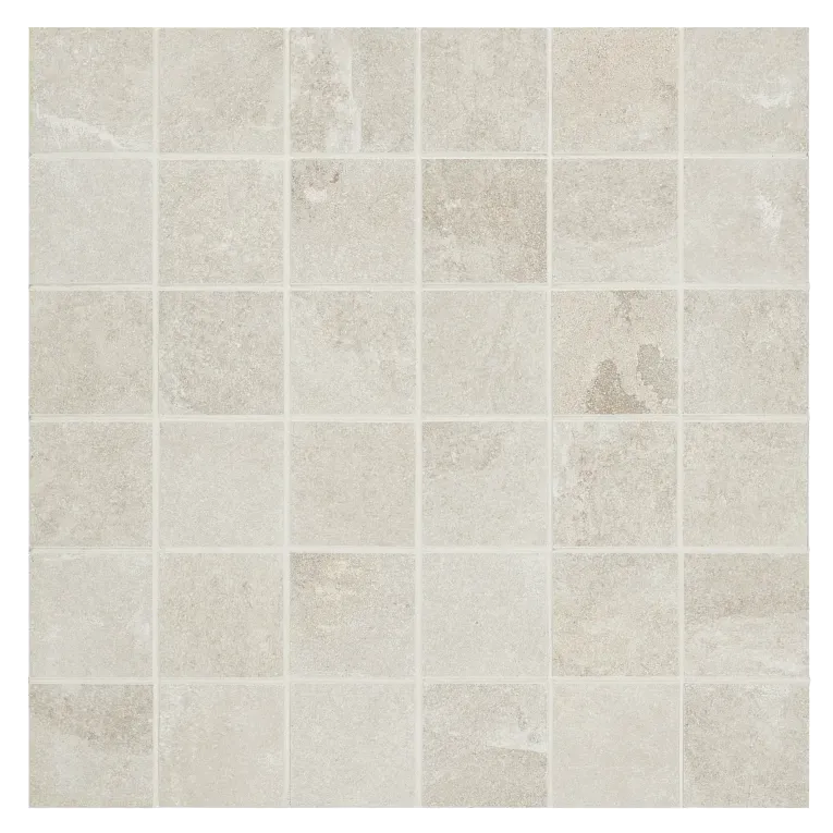 A white tile floor with some small squares