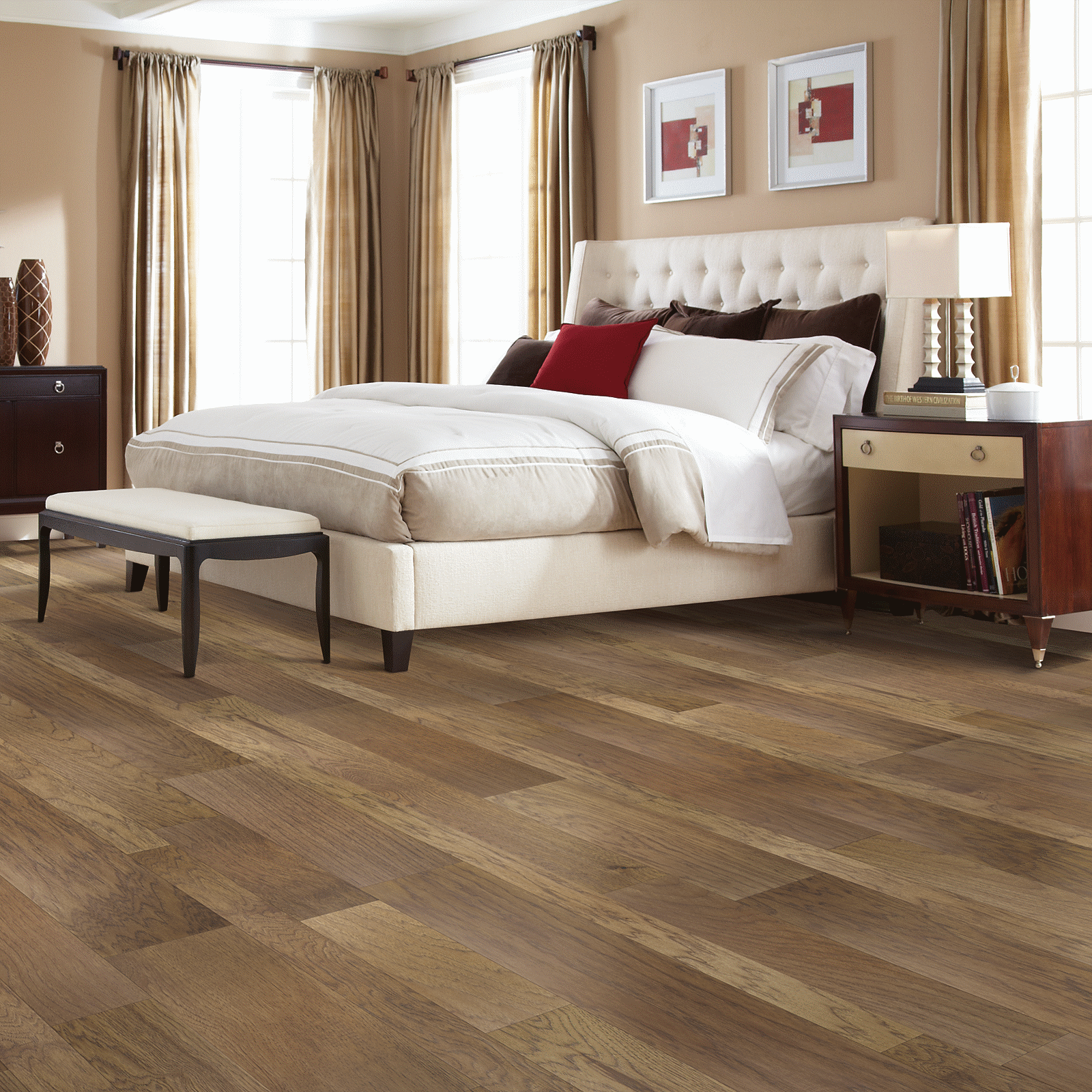 A bedroom with a bed and nightstand in it