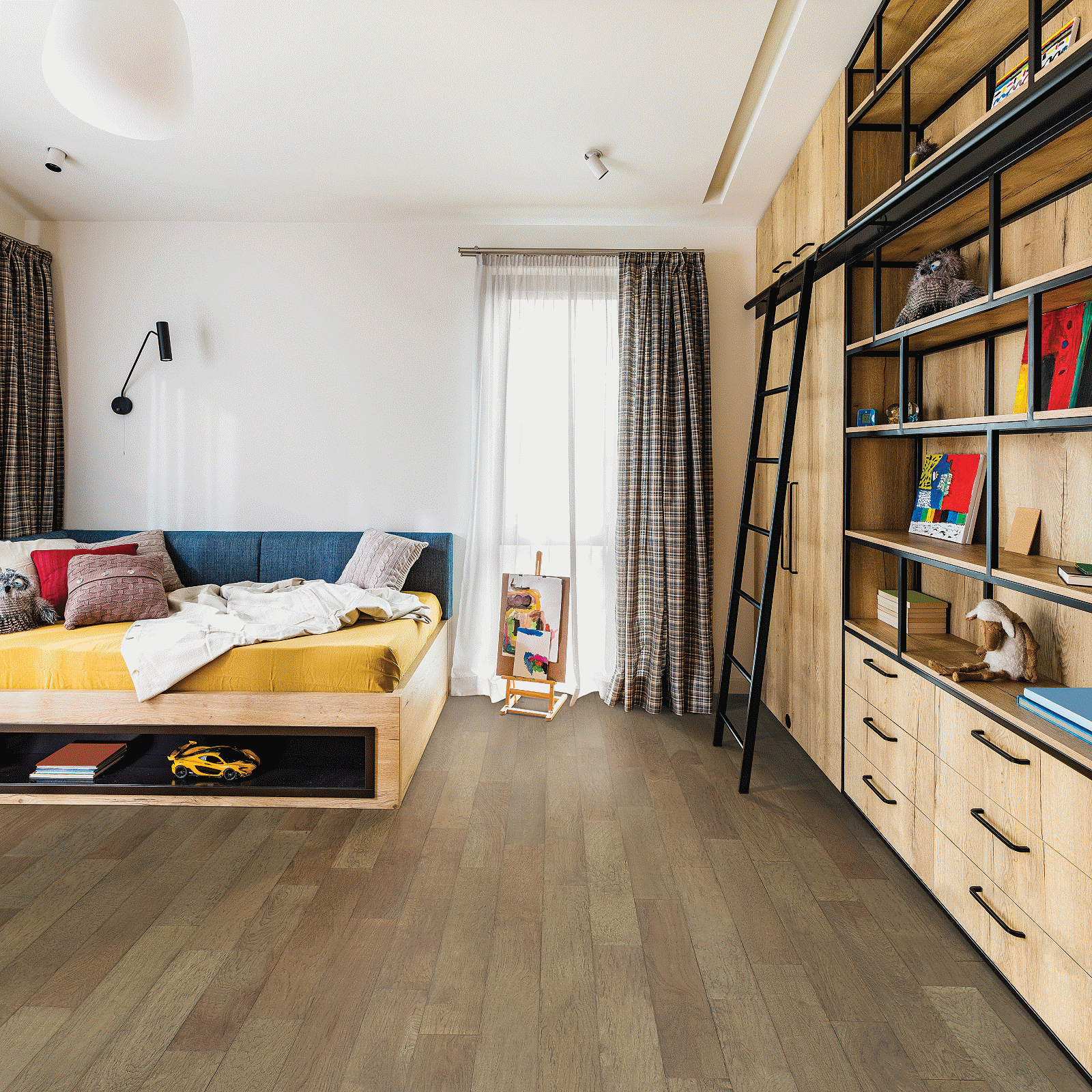 A bedroom with a bed, bookshelf and window.