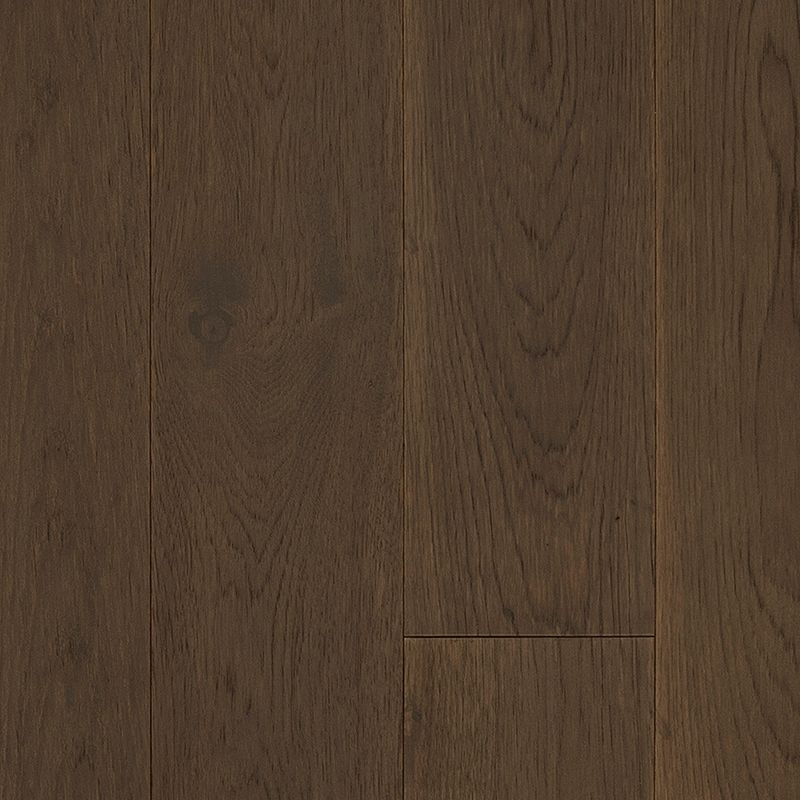 A dark brown wood floor with no grain.