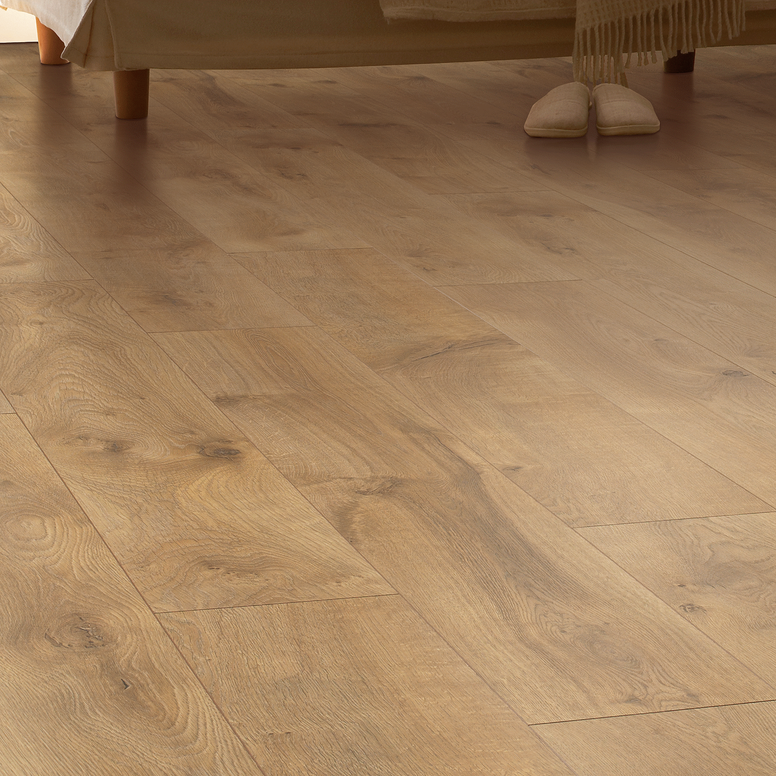 A person standing on top of a wooden floor.