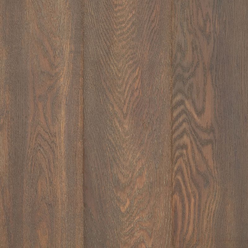 A close up of the wood grain on the floor.