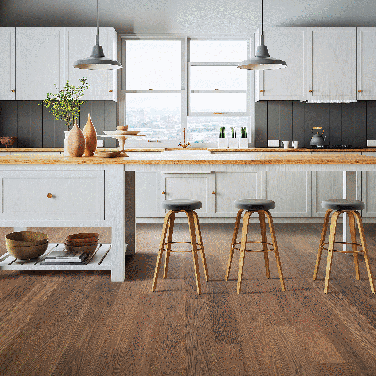 A kitchen with wooden floors and white cabinets.
