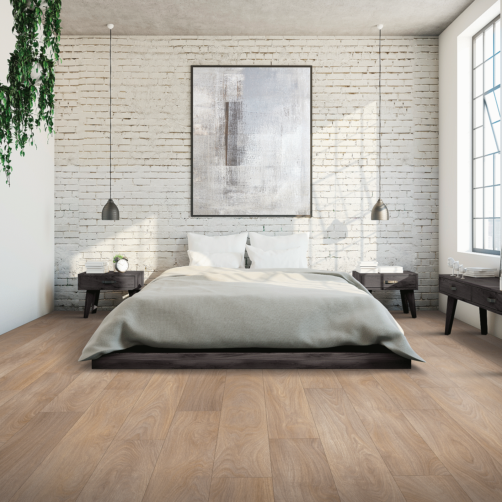 A bedroom with a bed and two lamps.