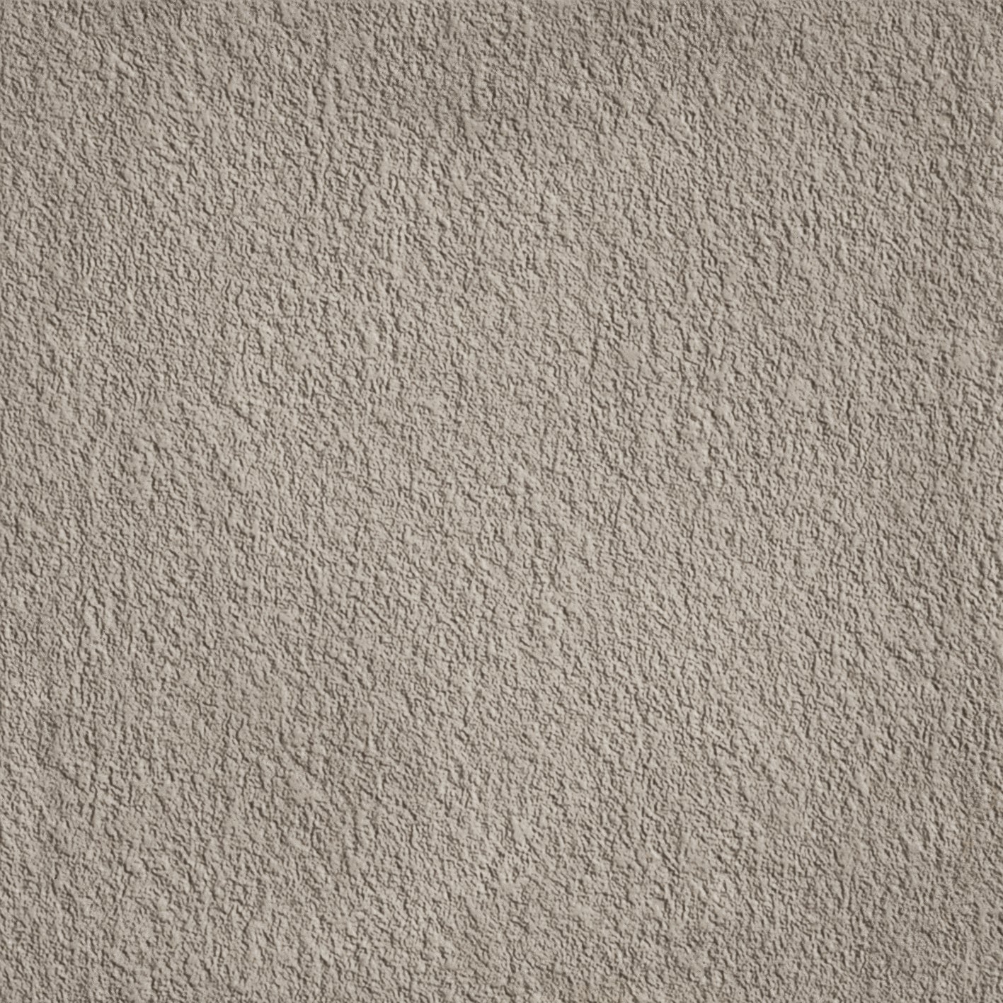 A gray wall with some white spots on it