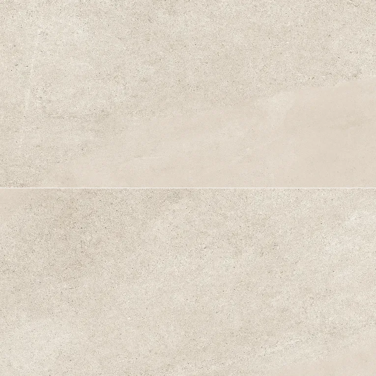 A white tile floor with some small bubbles