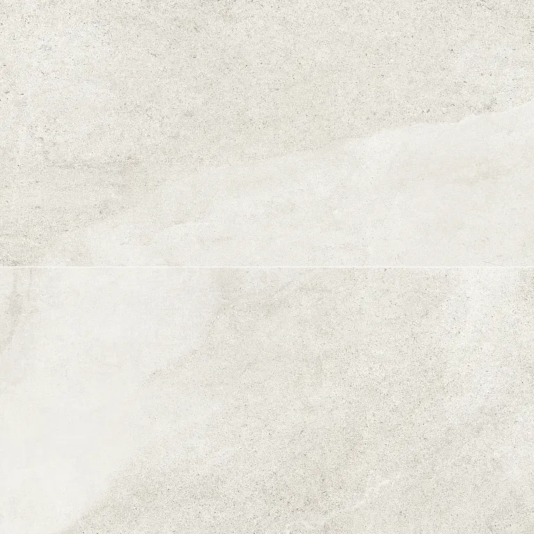 A white marble floor with some light colored stones