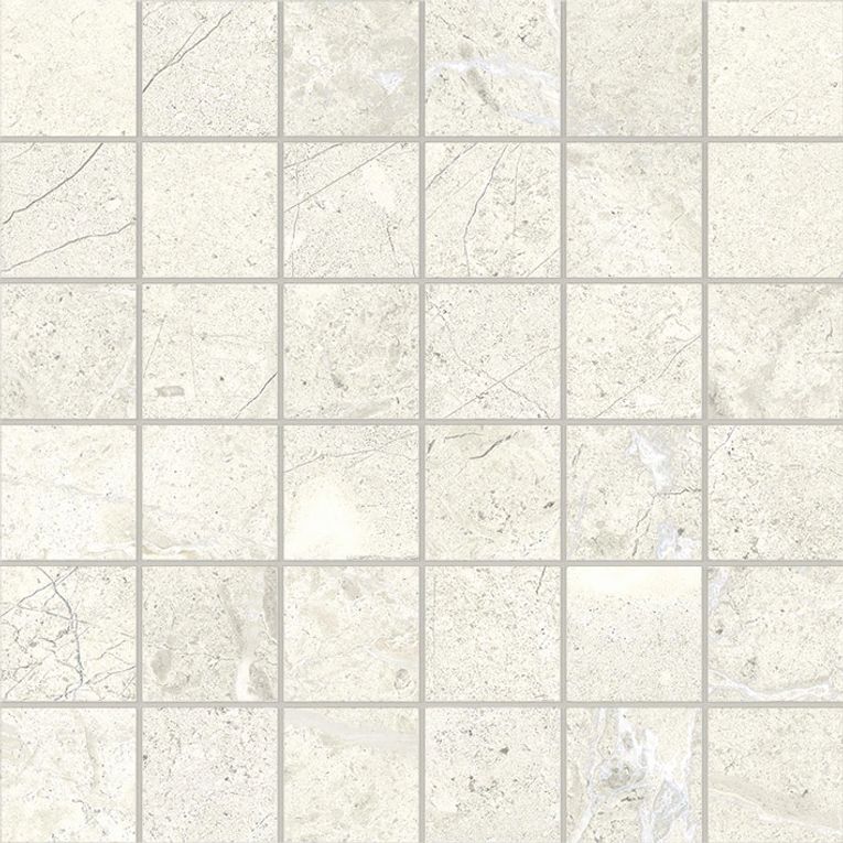 A white tile floor with some small squares