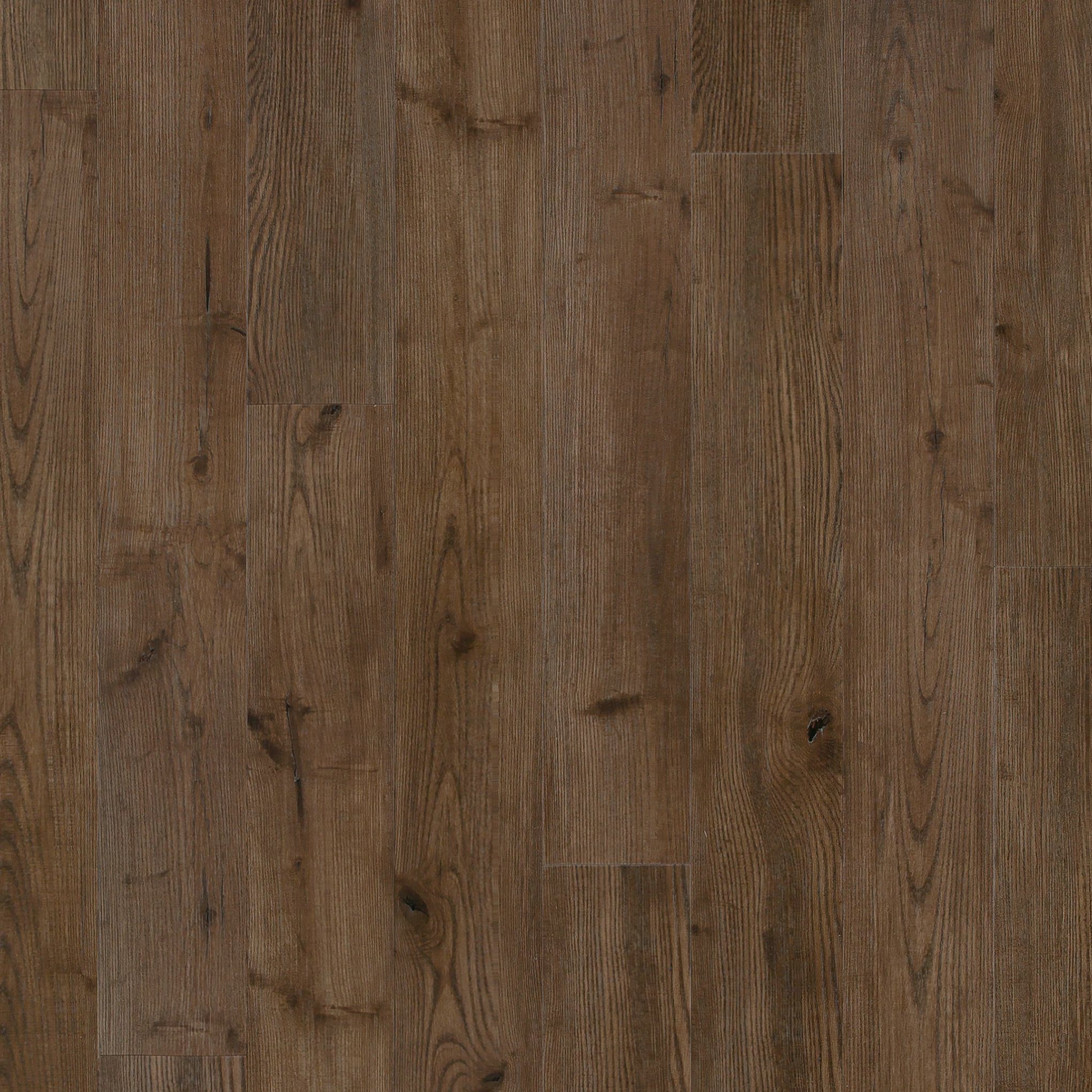 A close up of the wood grain on the floor.