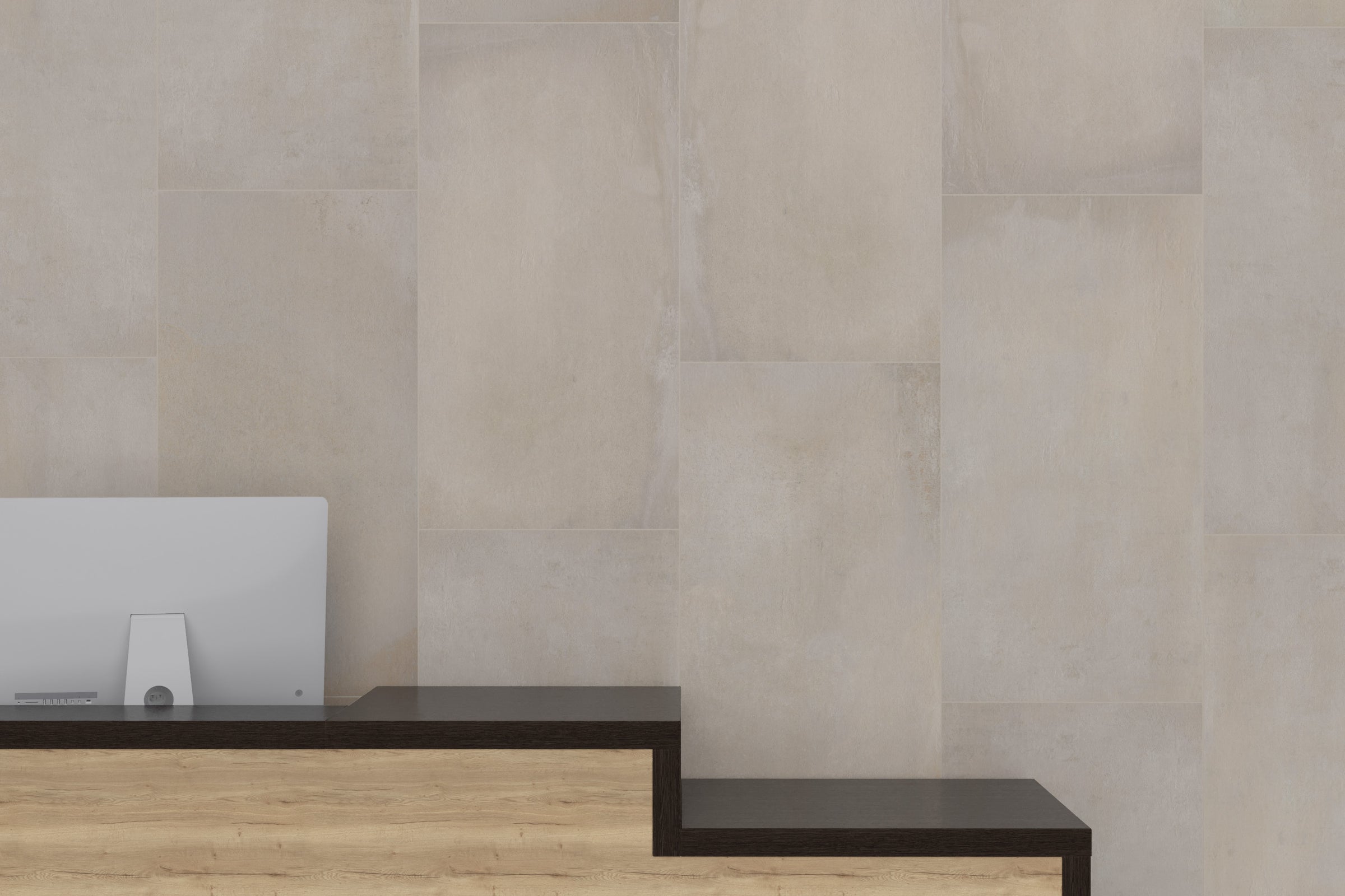 A wall with some steps and a laptop on top of it