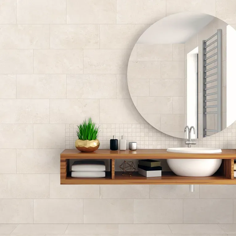 A bathroom with a sink and mirror in it