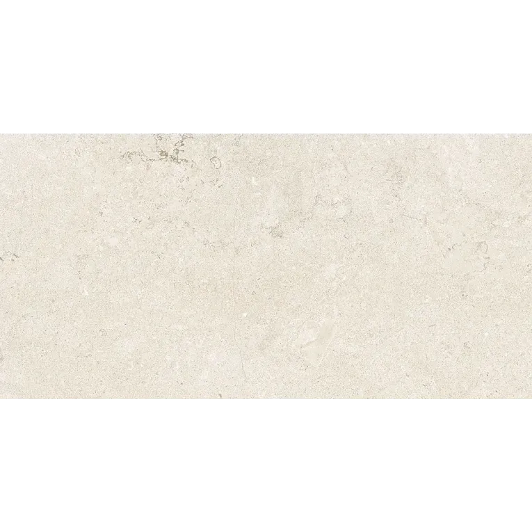 A white stone surface with some brown spots