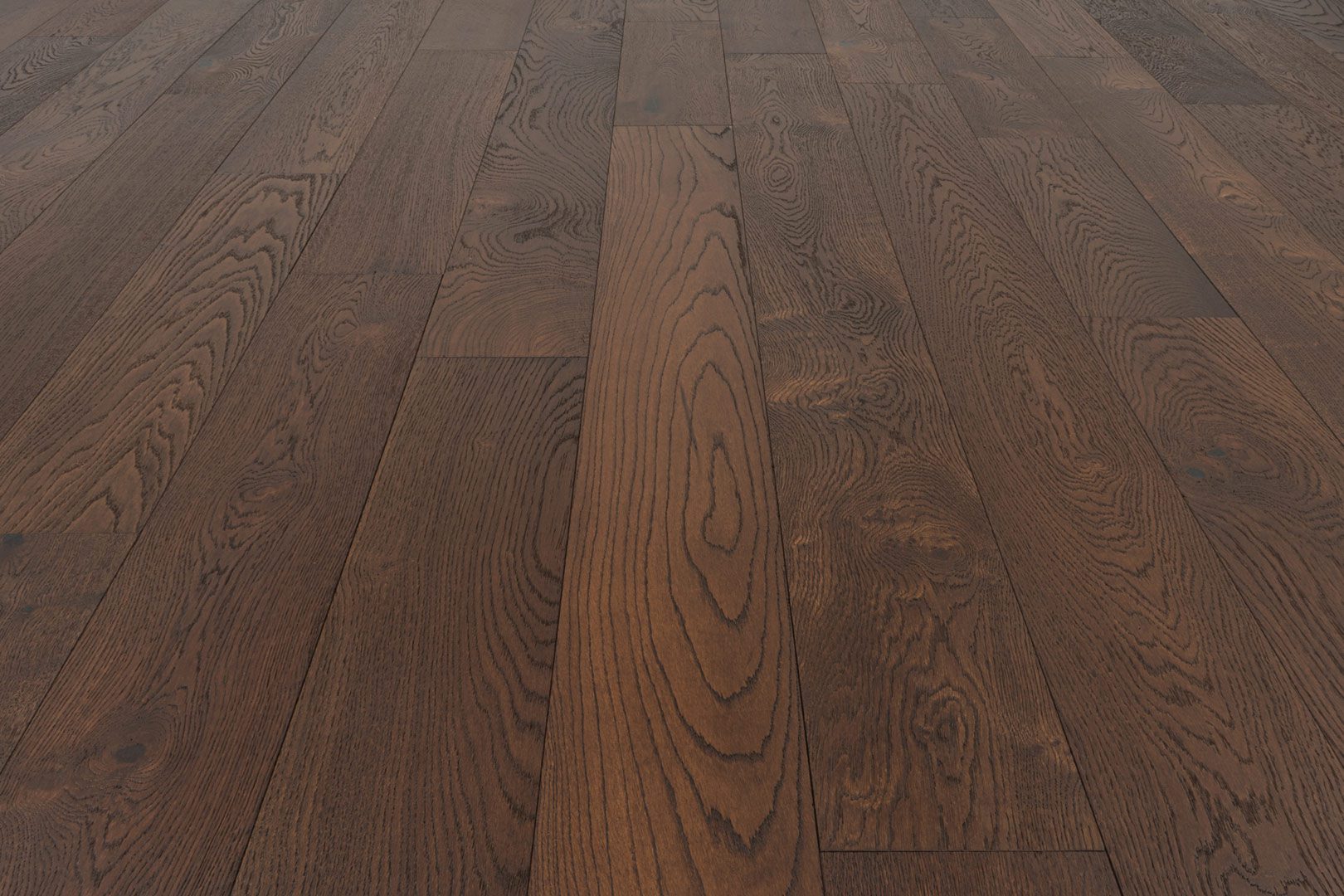 A close up of the wood grain on the floor.