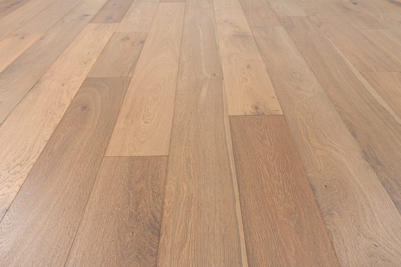 A close up of the wood floor with no grain.