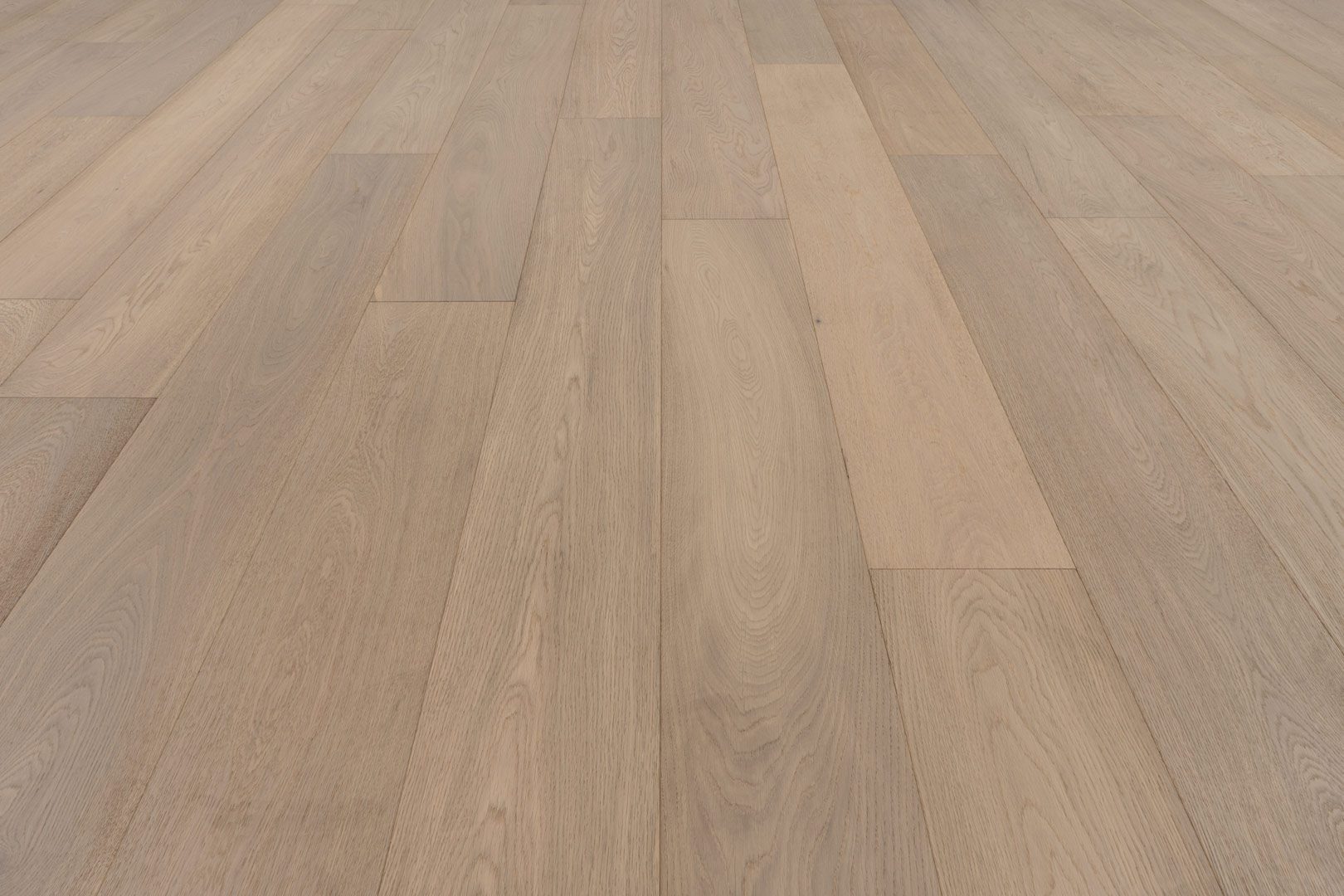 A close up of the wood floor with no one around.