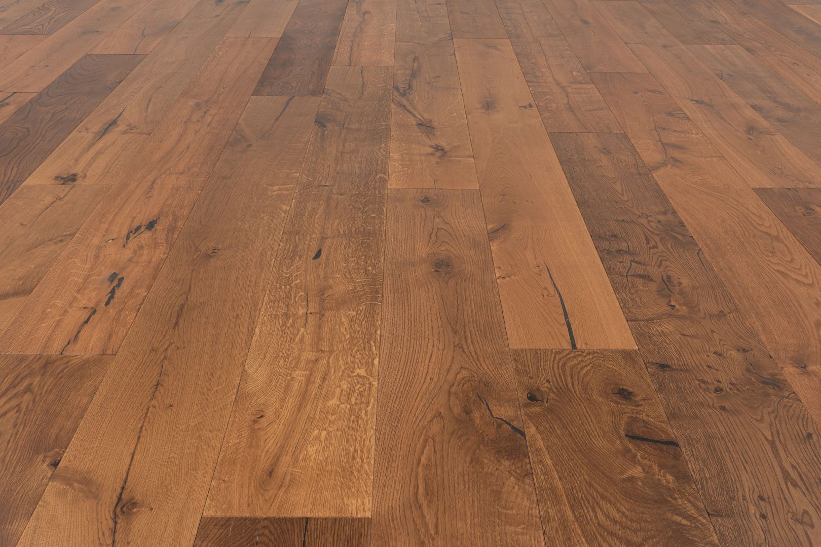 A close up of the wood grain on the floor.