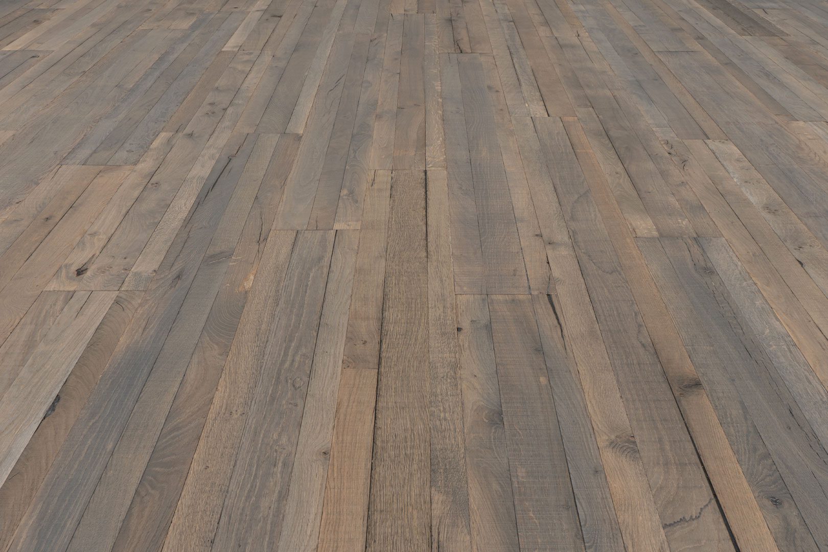 A wooden floor with many different wood planks.