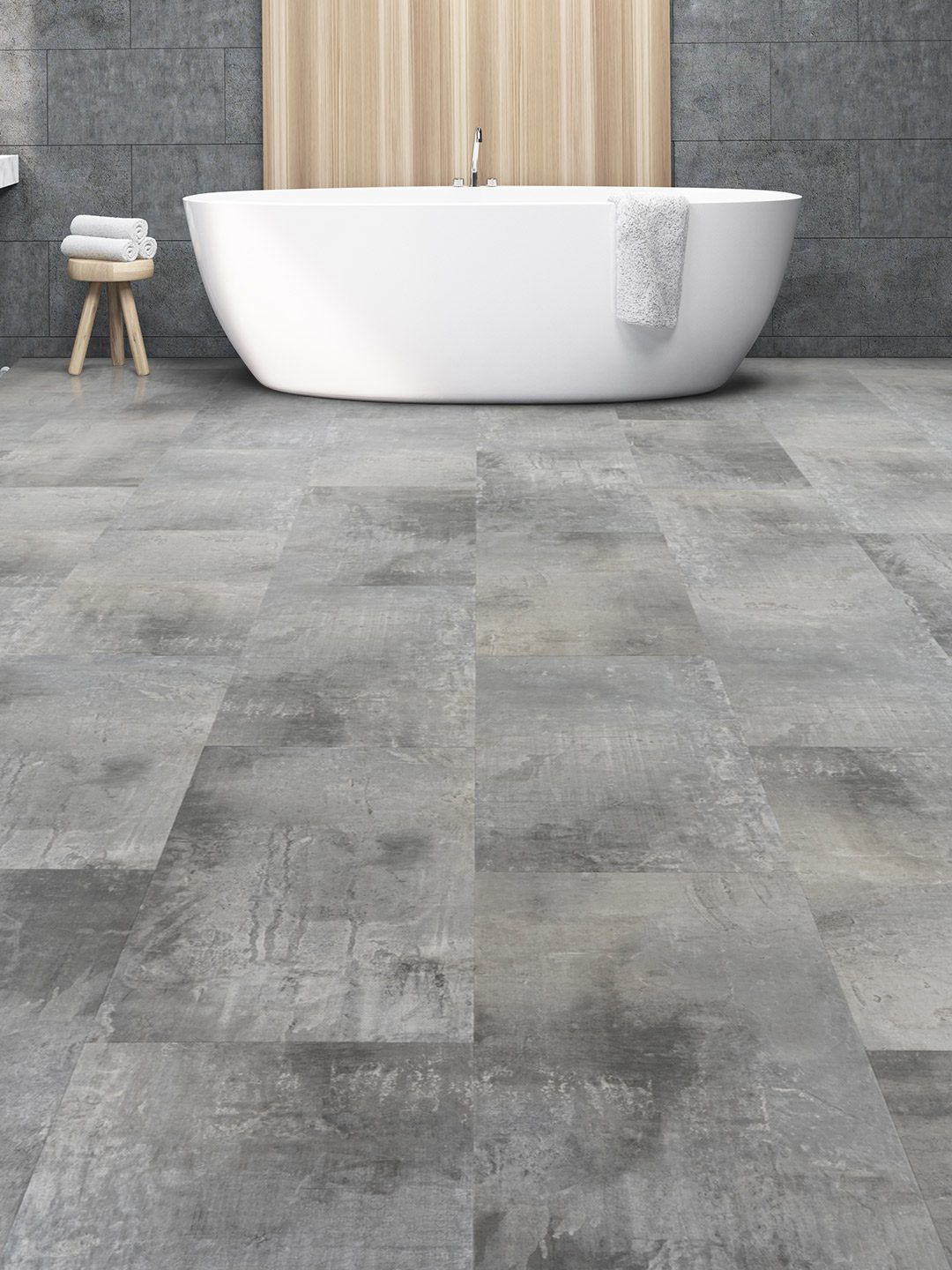 A bathroom with a tub and tiled floors