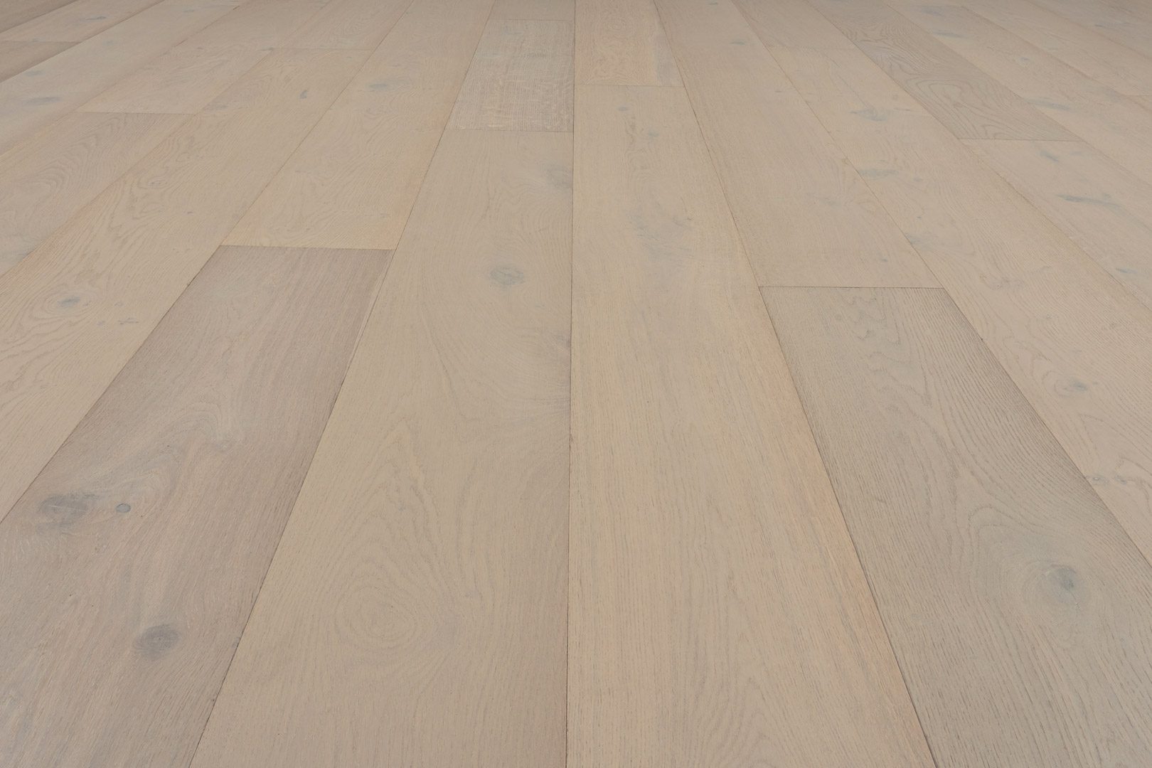 A close up of the wood grain on the floor.