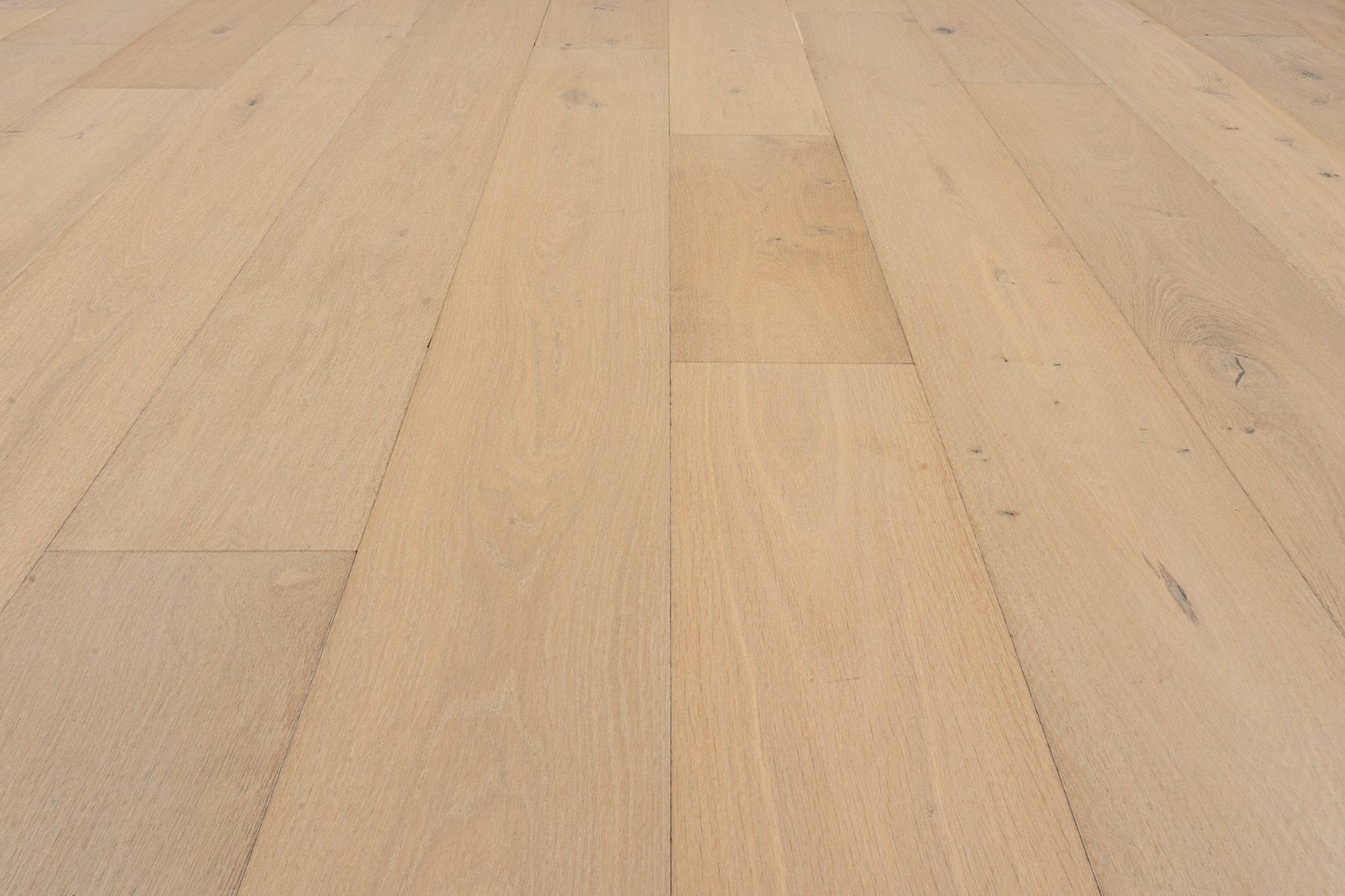 A close up of the wood grain on the floor.
