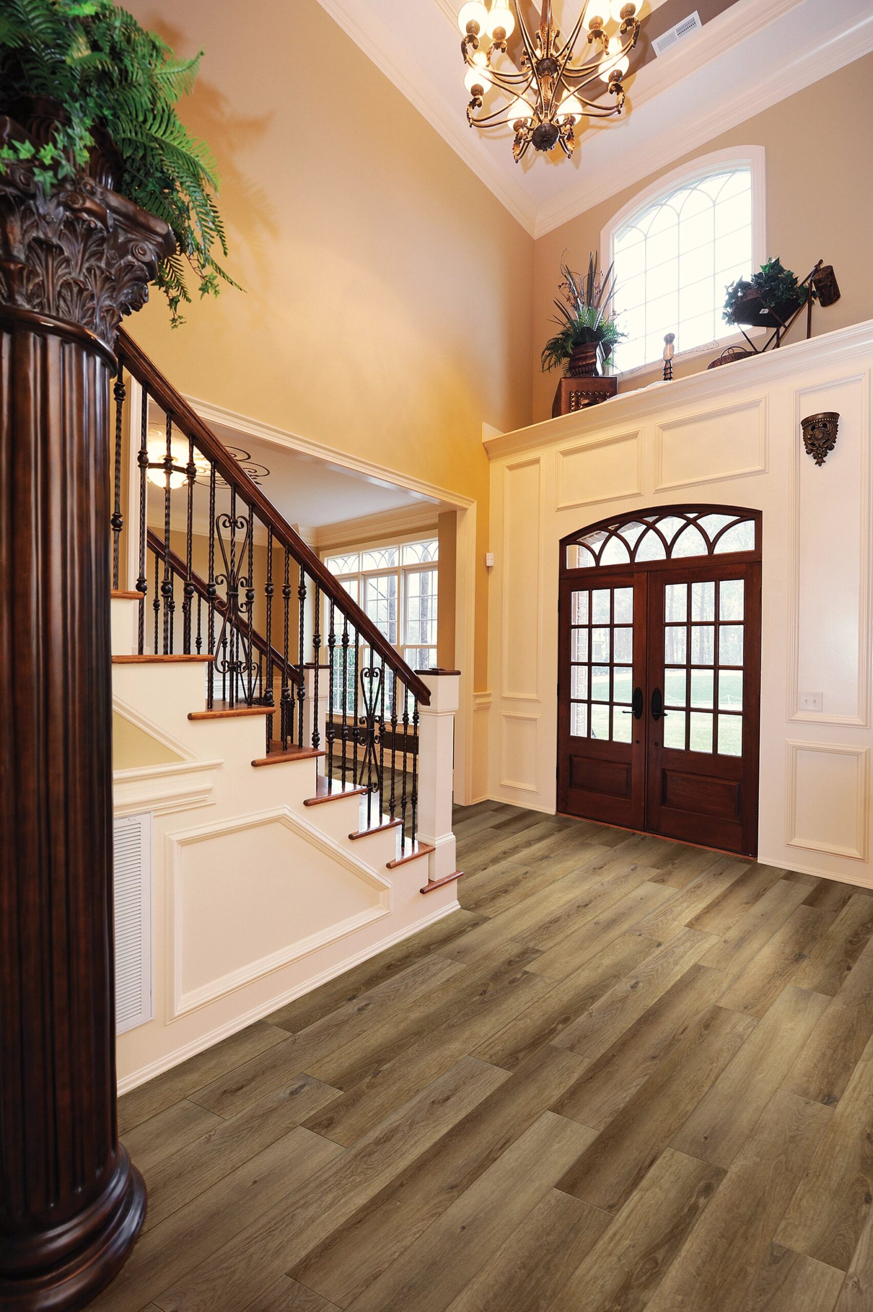 A large entry way with two sets of stairs.