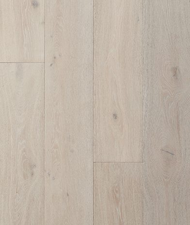 A white wood floor with some type of stain on it