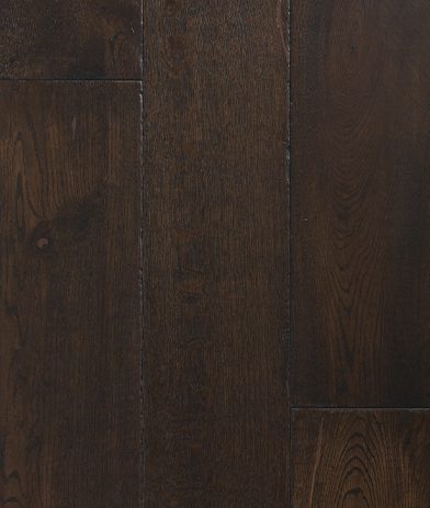 A dark wood floor with some brown lines