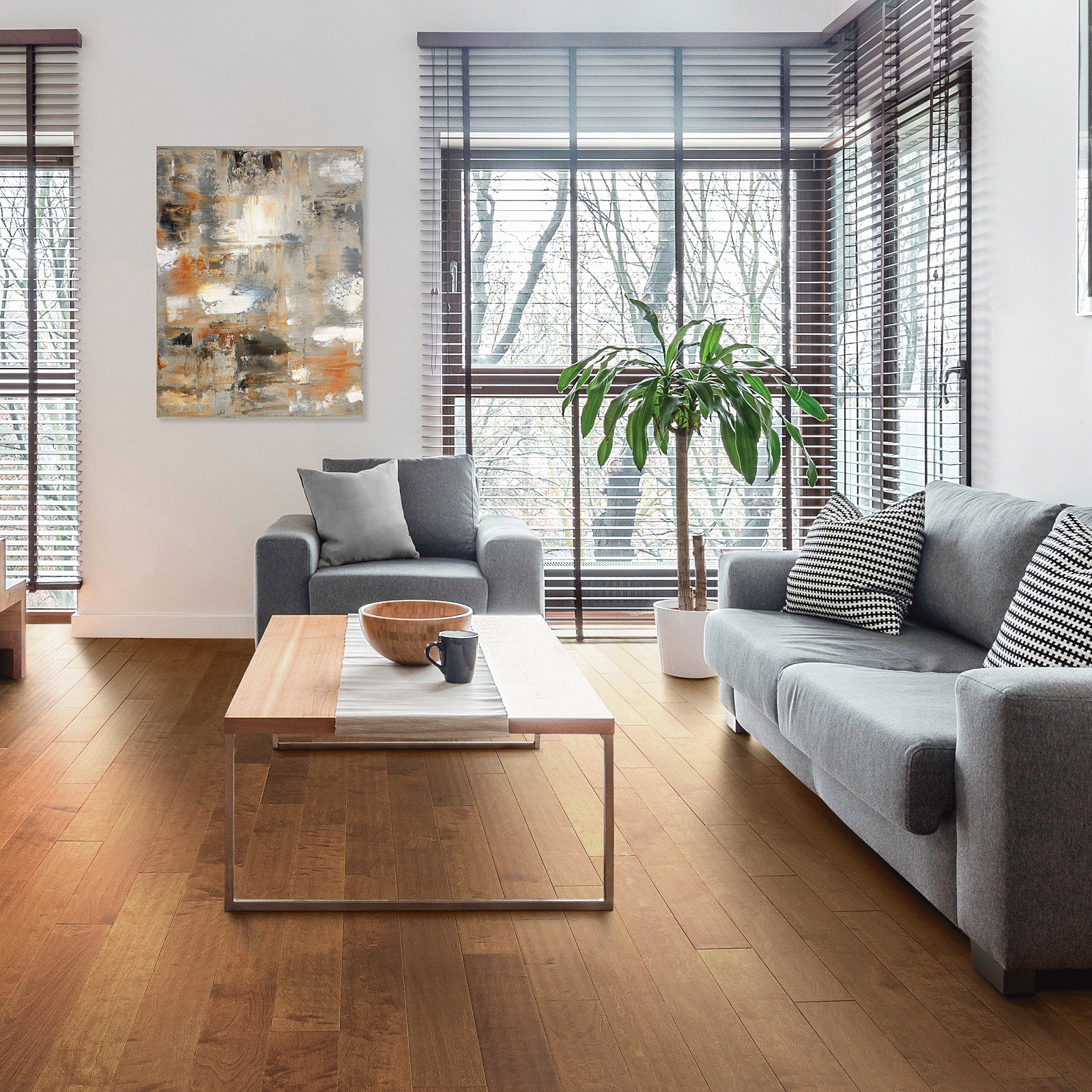A living room with wooden floors and furniture.