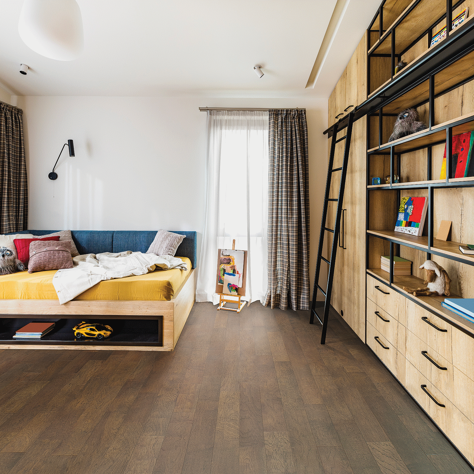 A bedroom with a bed, bookshelf and window.