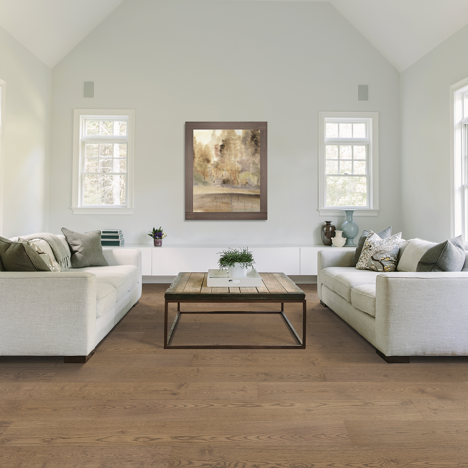 A living room with couches and tables in it