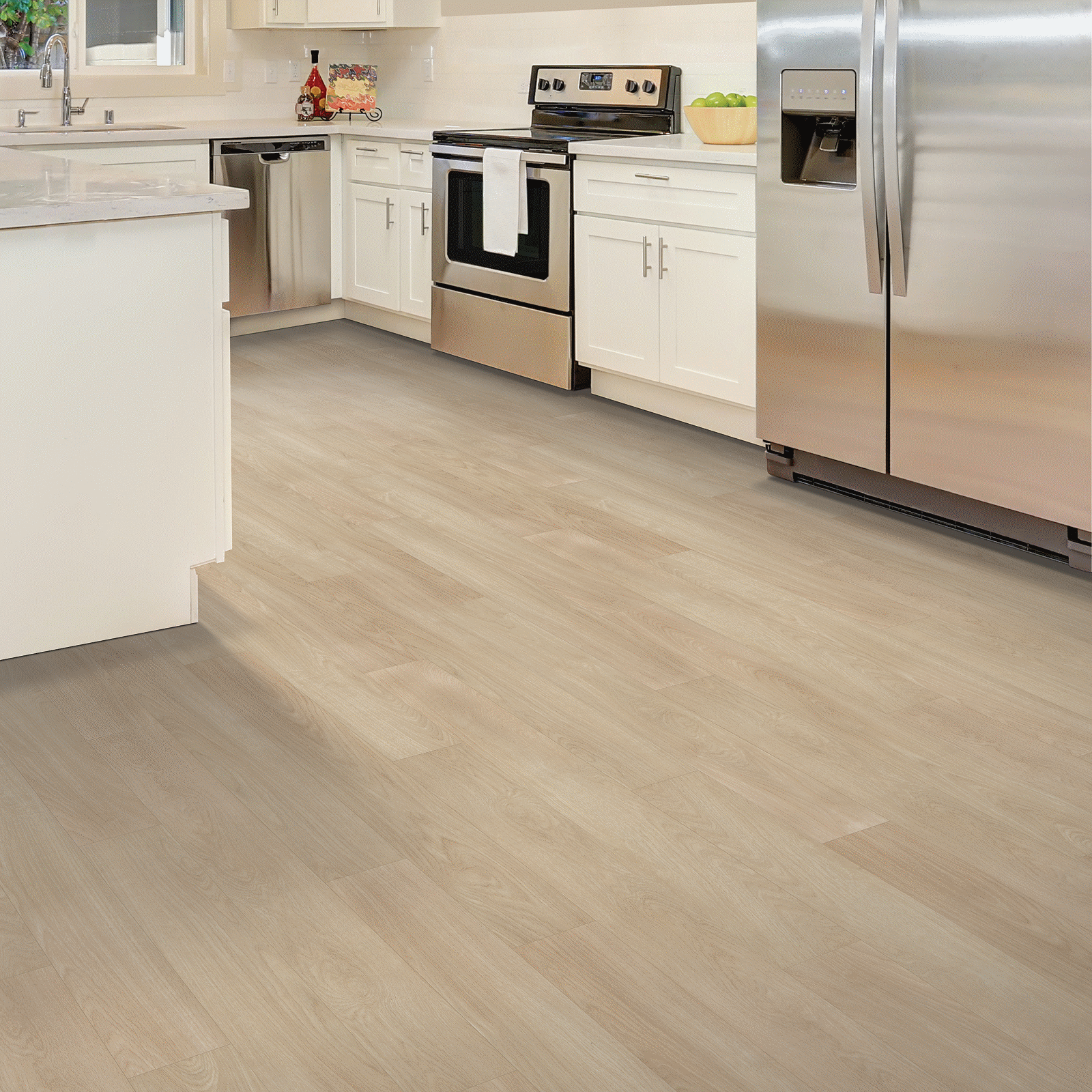 A kitchen with white cabinets and stainless steel appliances.