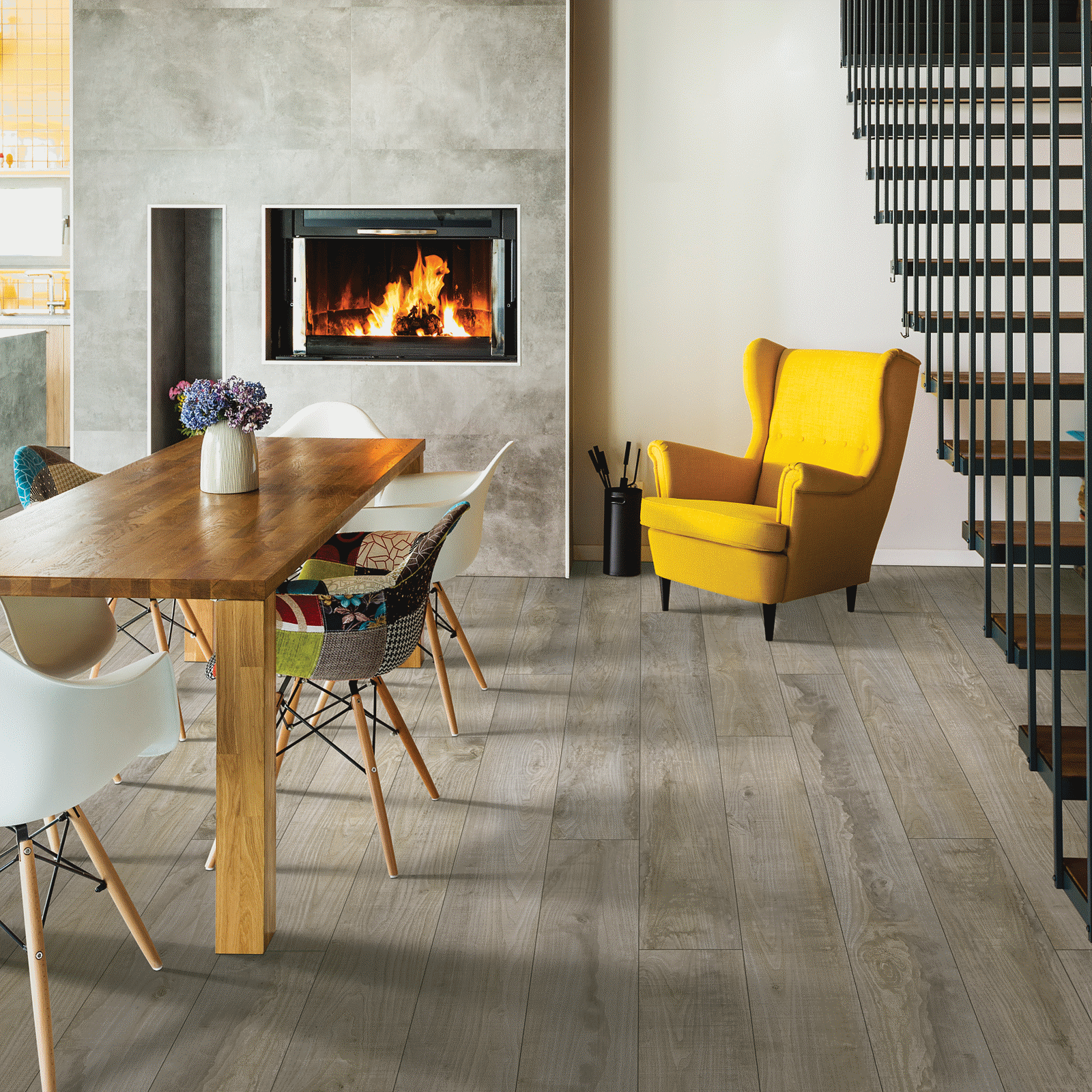 A dining room with a fireplace and a table