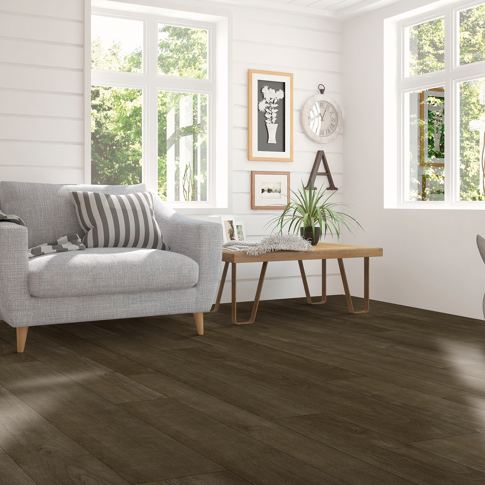 A living room with white furniture and wood floors.