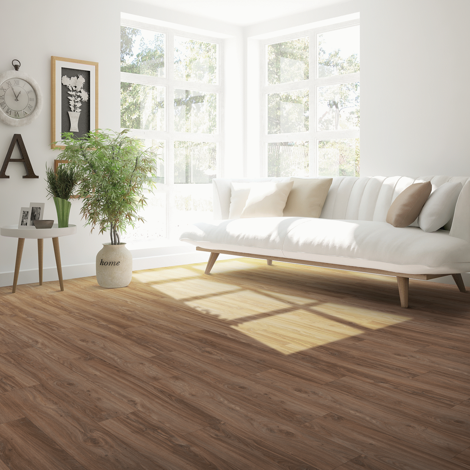 A living room with white furniture and wooden floors.