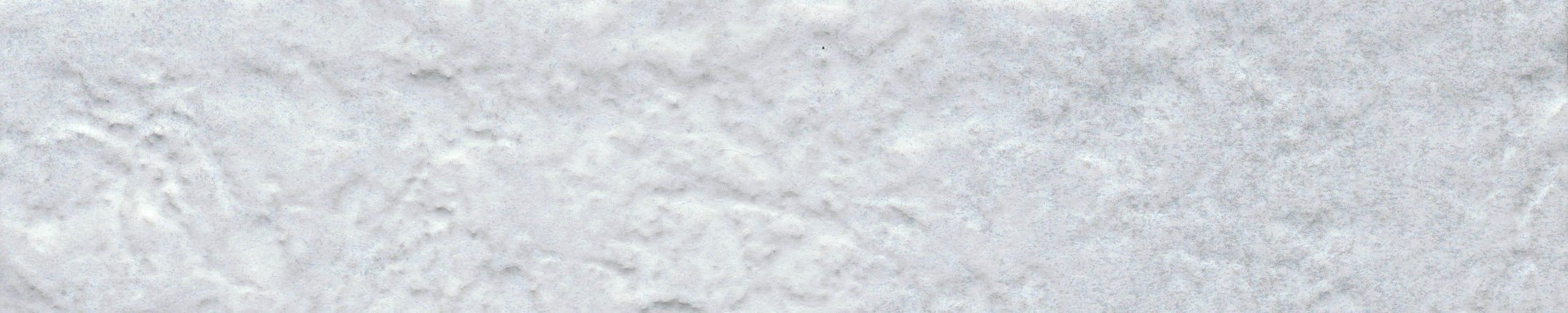 A white background with some type of substance on it