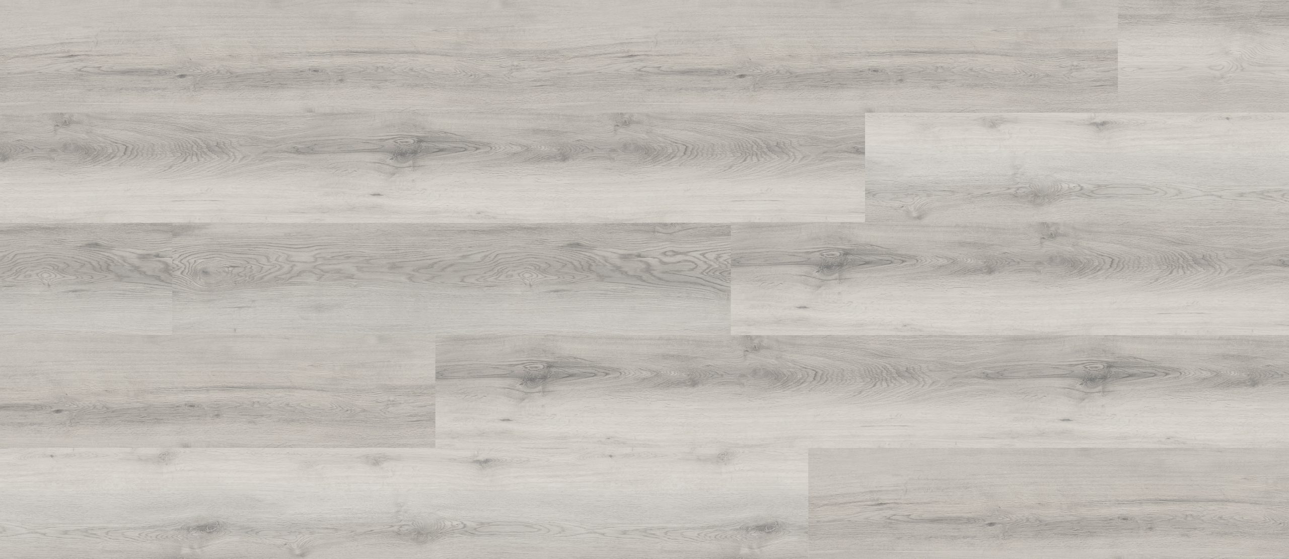 A white wood floor with some type of wood grain