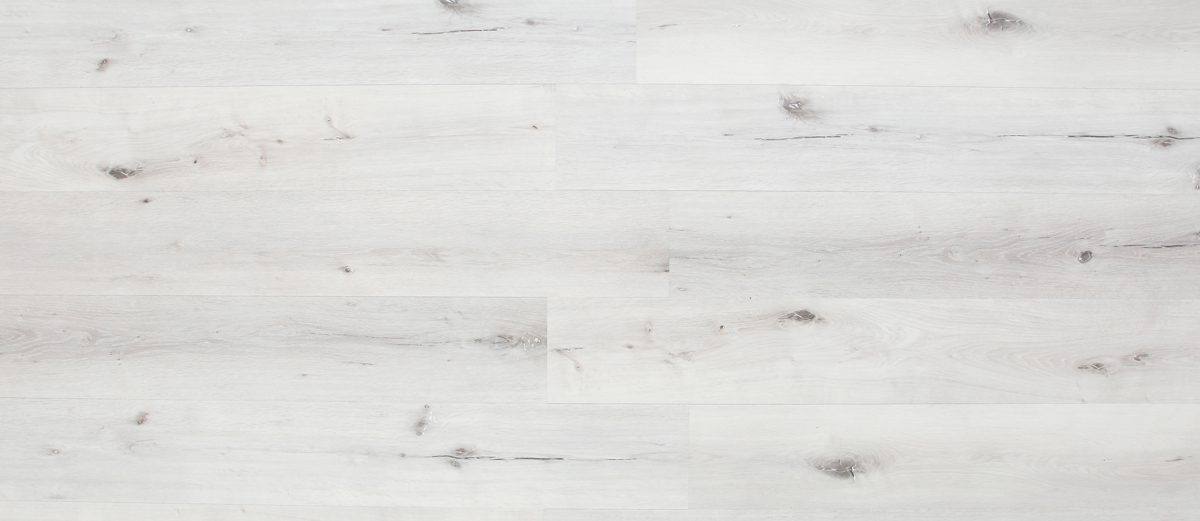 A white wood floor with some gray streaks