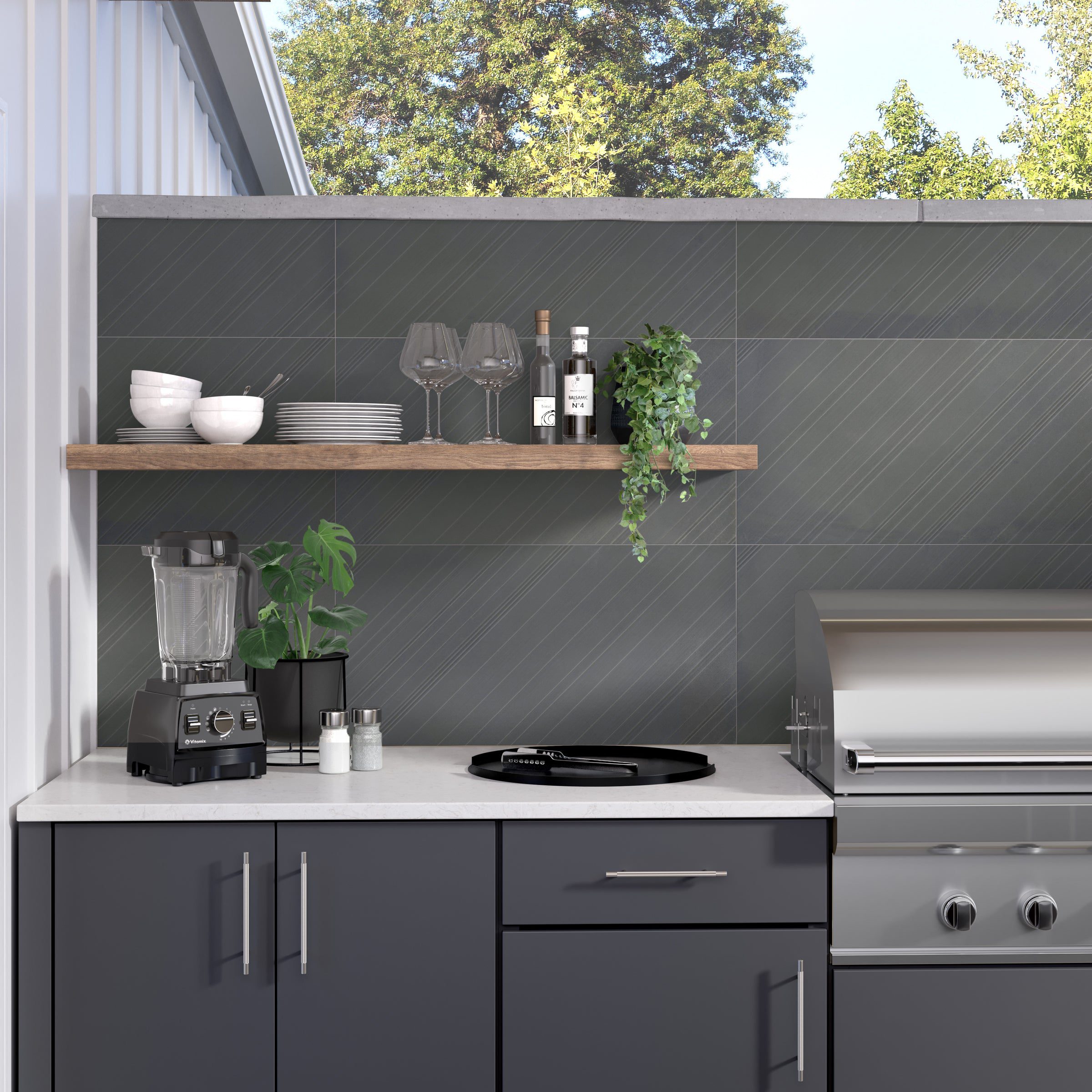 A kitchen with an oven and a grill