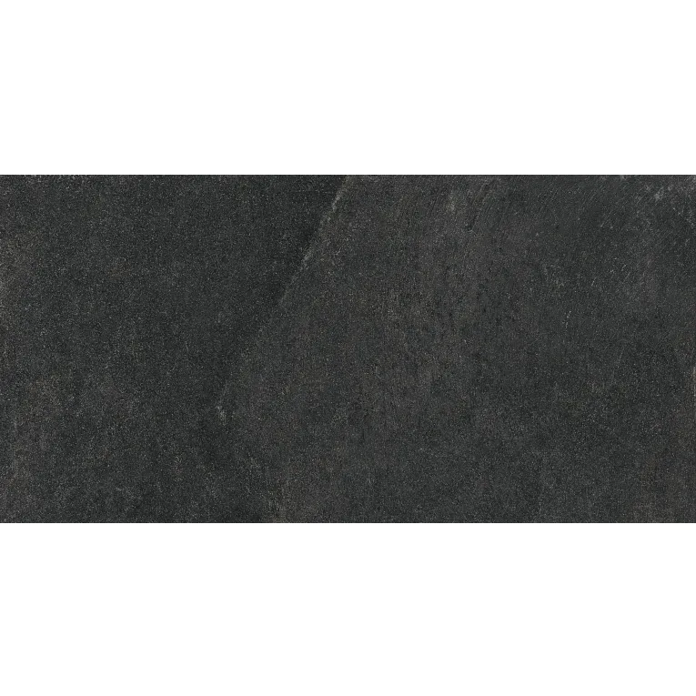 A black stone wall with some white writing on it