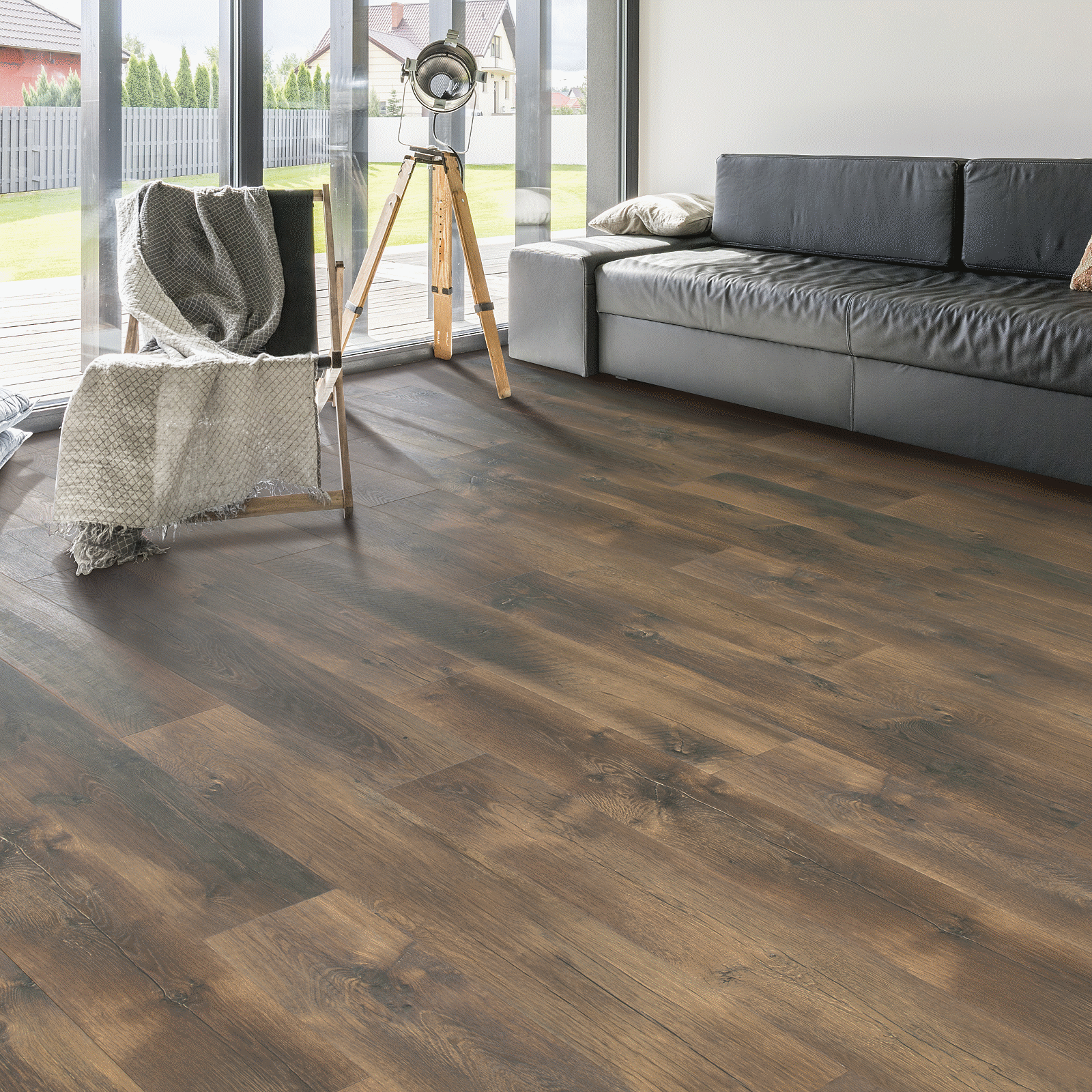 A living room with a couch and chair