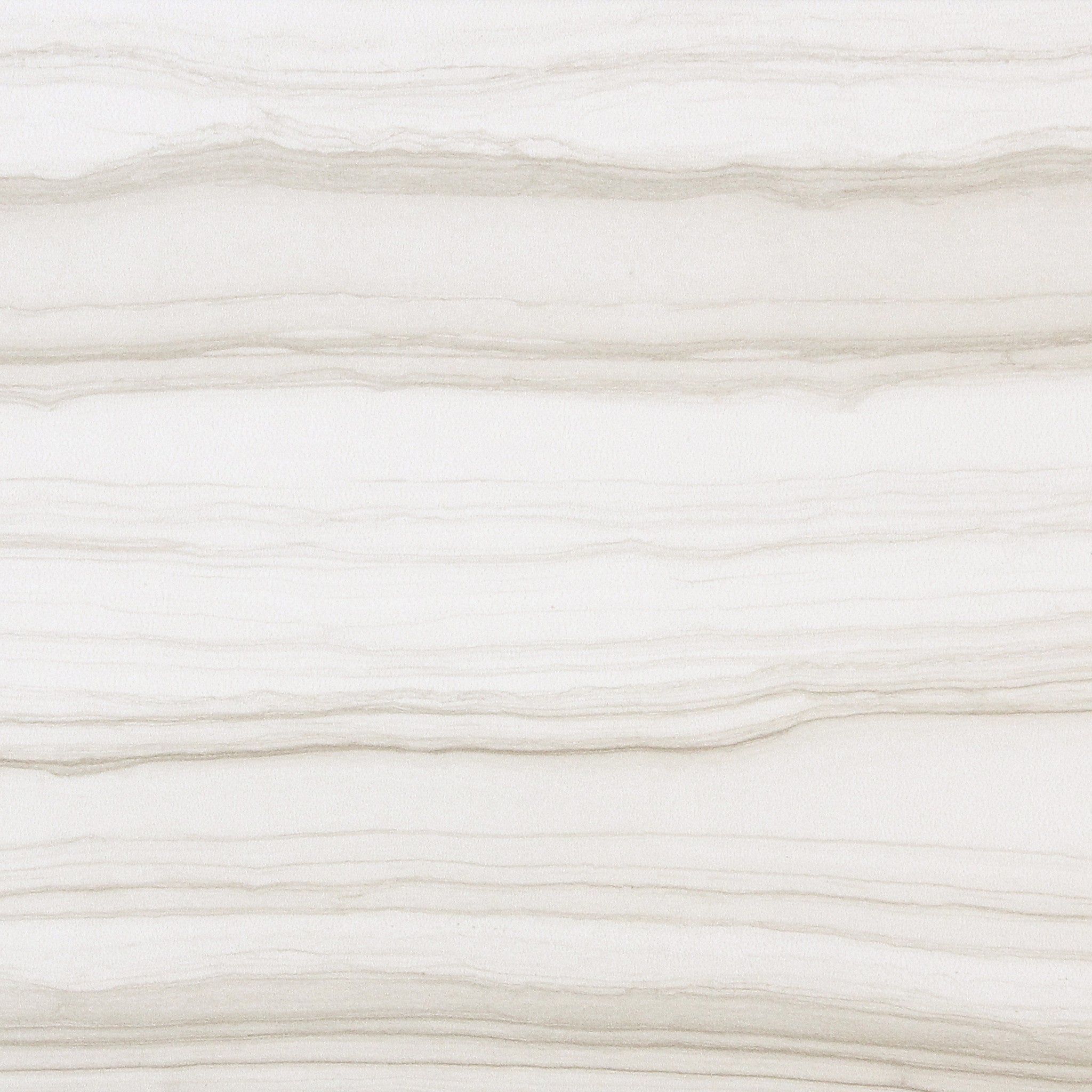 A white marble surface with some very thick lines.