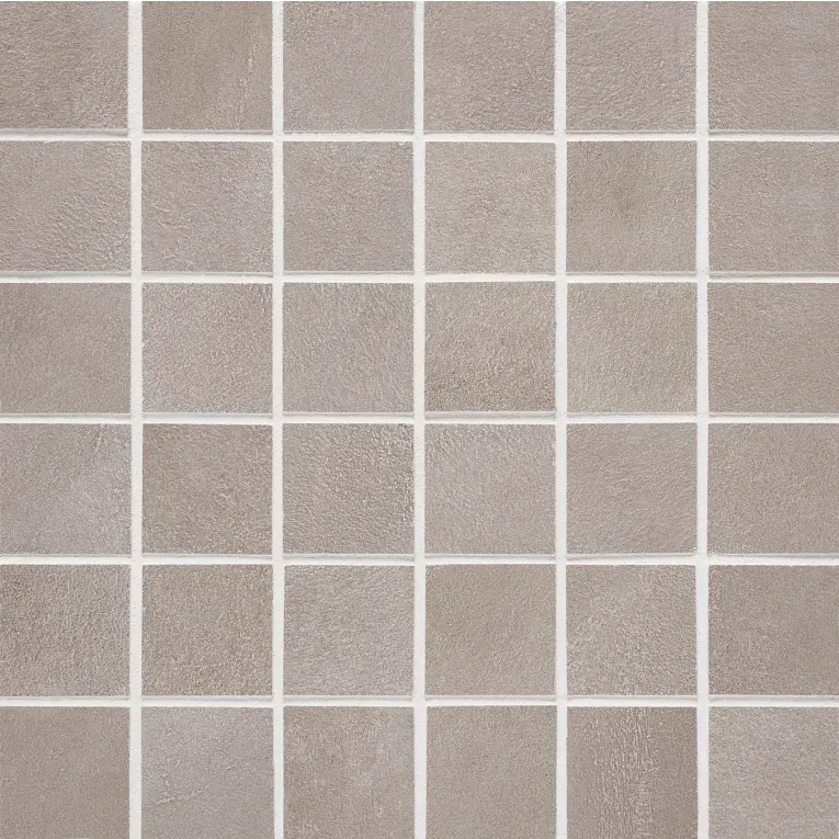 A close up of the tile surface of a bathroom floor