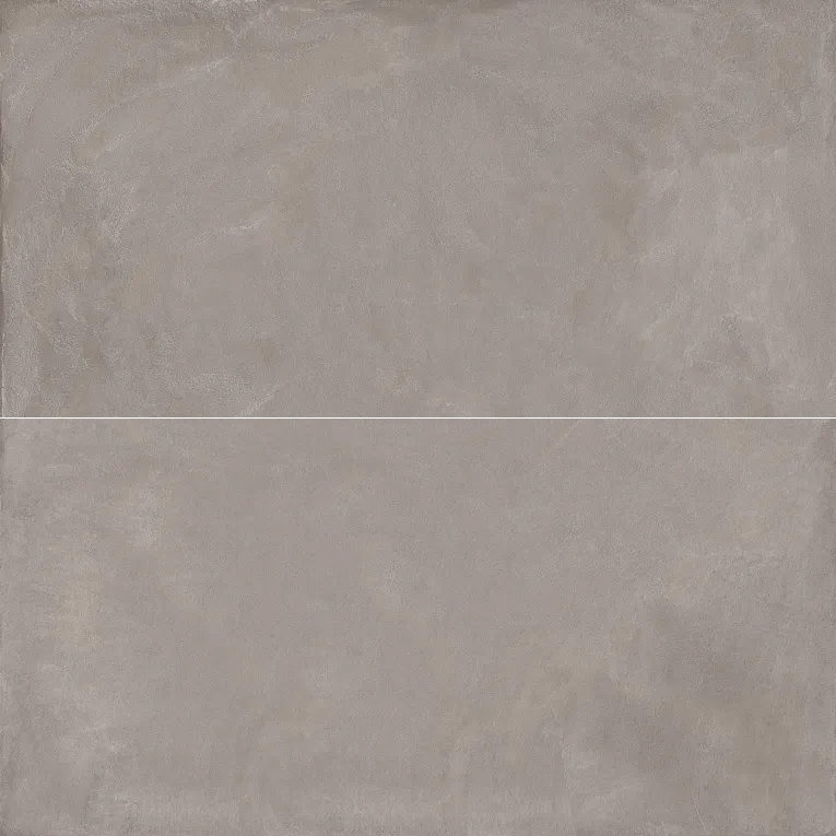 A gray tile background with some white spots