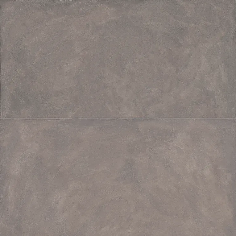 A gray tile background with some white spots
