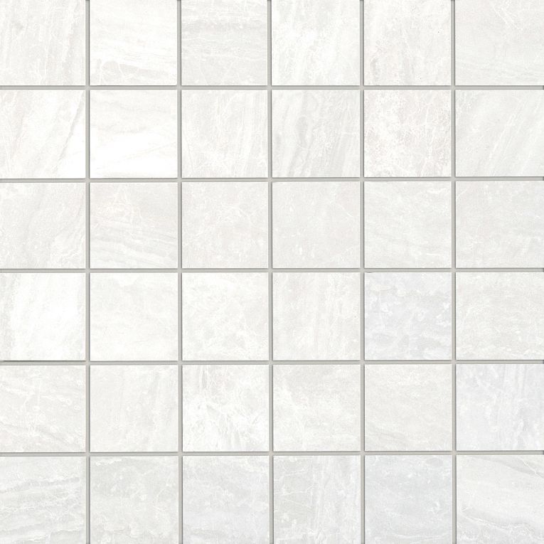 A white tile floor with some small squares