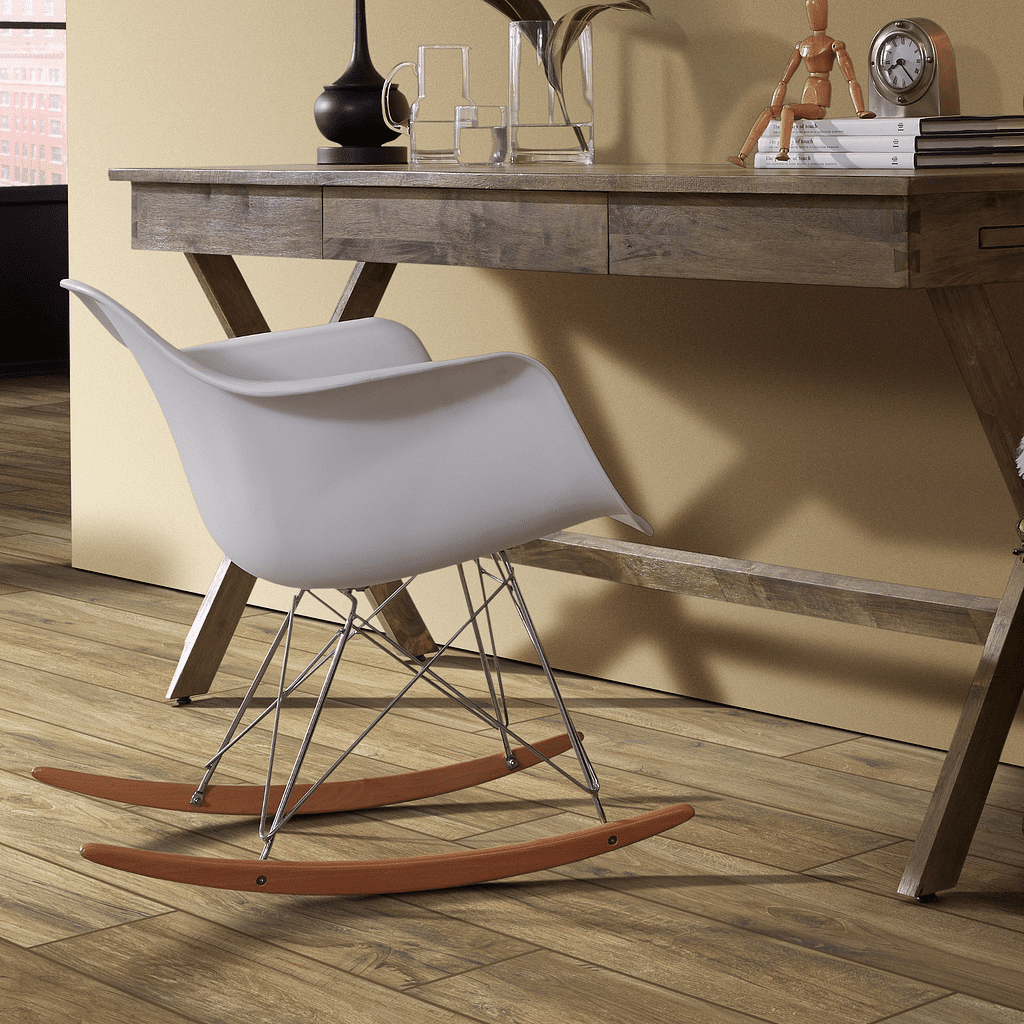 A wooden desk with two white chairs and a table