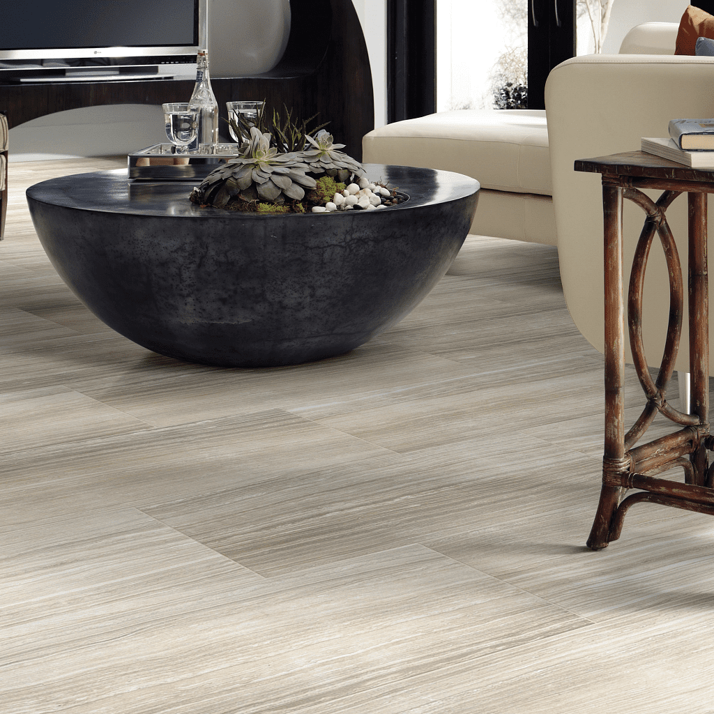 A living room with a couch and table