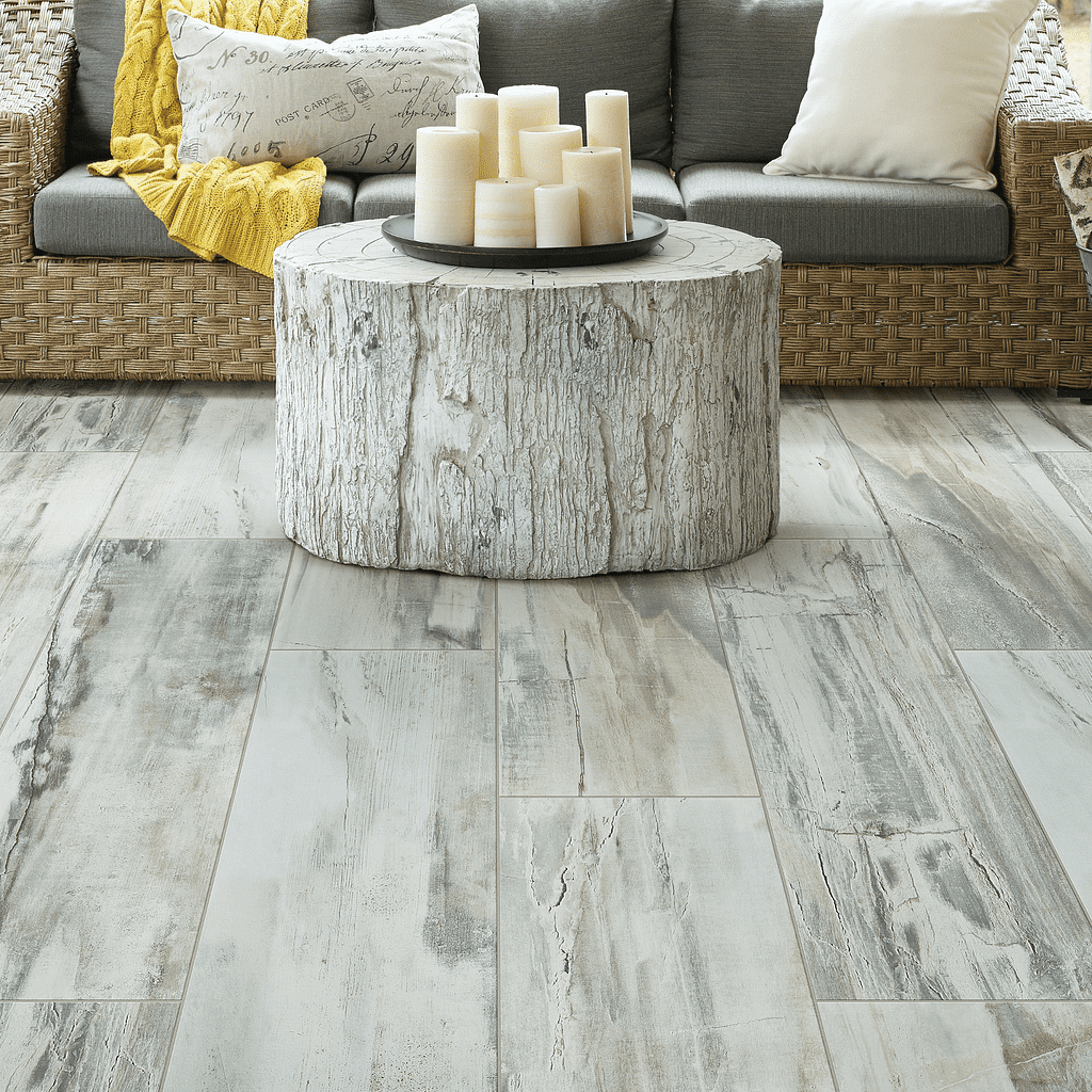 A patio with a couch and table in it