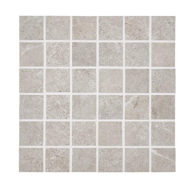 A white tile floor with some small squares
