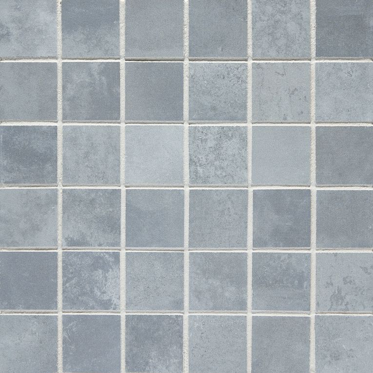 A close up of the tile pattern in a bathroom